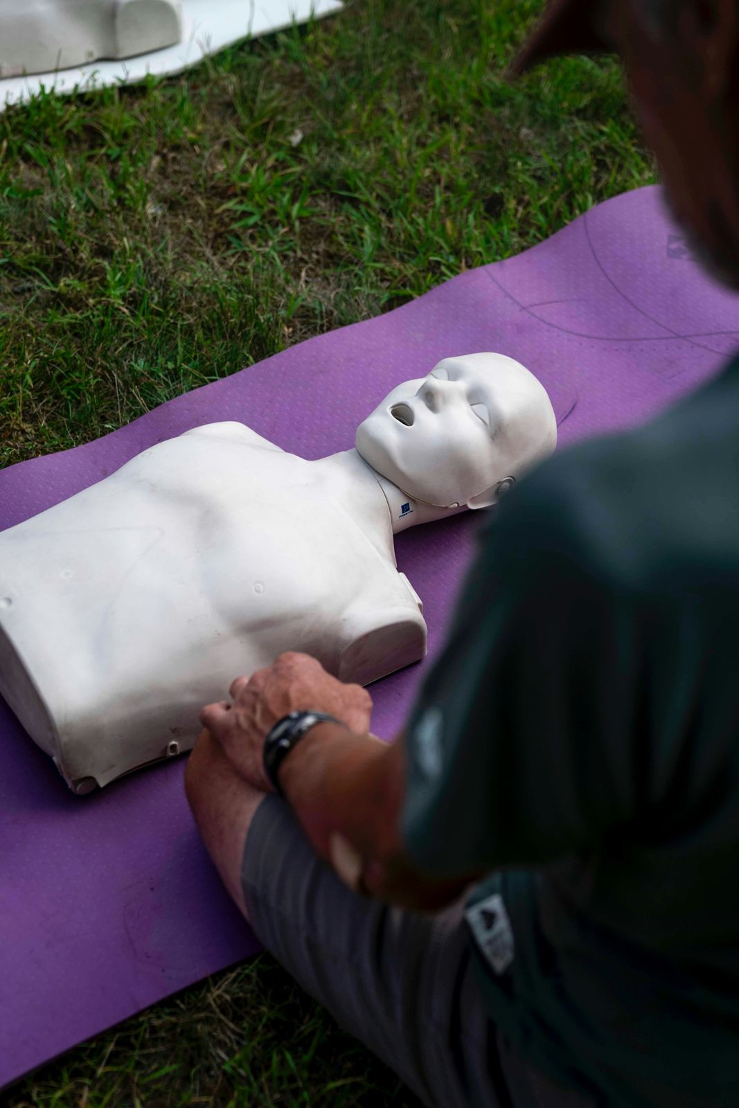 Hands on a CPR manikin